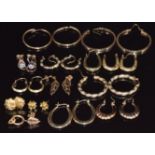 Seven pairs of 9ct gold hoop earrings and 9ct gold stud earrings, 15g