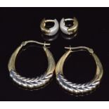 A pair of 14ct bi-coloured earrings (3.4g) and a pair of 9ct gold earrings (1.8g)