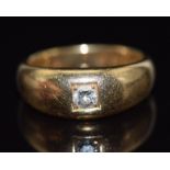 An 18ct gold ring set with a round cut diamond, London 1931, 8g, size L