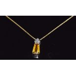 An 18ct gold pendant set with a yellow sapphire and three diamonds on an 18ct gold chain, 3.2g