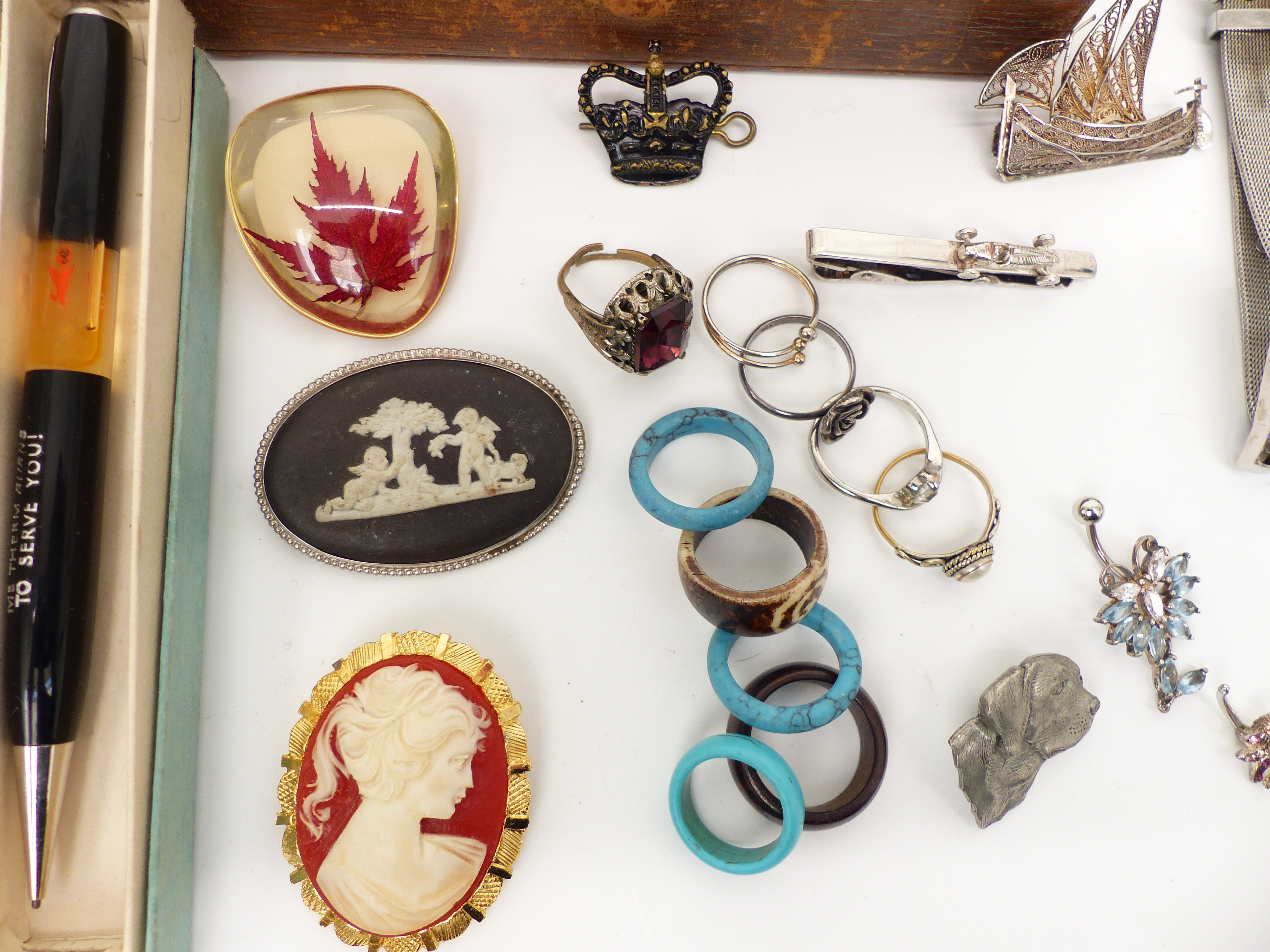 A collection of costume jewellery including brooches, silver topped bottle, silver edged - Image 3 of 7