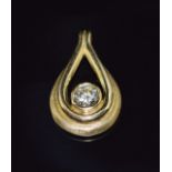 An 18ct gold tear drop pendant set with a round cut diamond of approximately 0.49ct, with