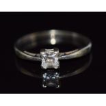 A 9ct white gold ring set with cubic zirconia, size N, 1.5g
