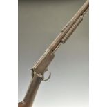 Winchester Model 1890 .22 pump-action rifle with adjustable sights and 24 inch octagonal barrel