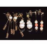 Two pairs of 9ct gold earrings set with pearls and a pair of 9ct gold earrings set with coral and