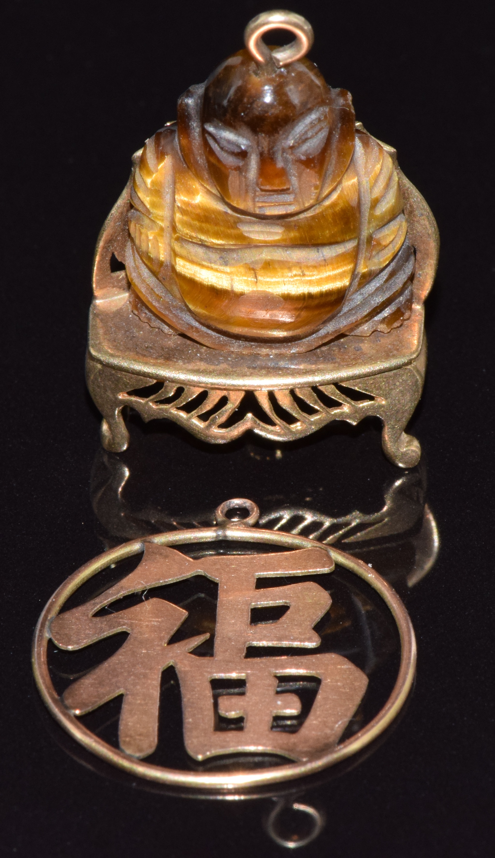 Chinese 14k gold pendant in the form of a Chinese character (1g) and a 9ct gold pendant set with a
