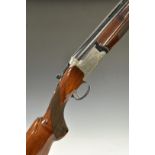 Nikko Model 5300 12 bore over and under ejector shotgun with engraved locks, trigger guard,