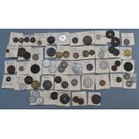 A collection of world coins contained in old hand written slips, largely 19th and early 20thC,