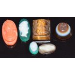 Cameos including tiger's eye, coral and agate and a banded agate intaglio, largest 1.5 x 0.8cm
