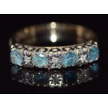 A 9ct gold ring set with topaz and diamond, 2.2g, size M/N