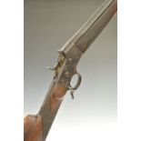Belgian 28 bore Remington rolling block rifle with chequered grip and forend, sling suspension