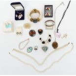 A collection of jewellery including silver ring set with labradorite, Tommy Hilfiger cufflinks,
