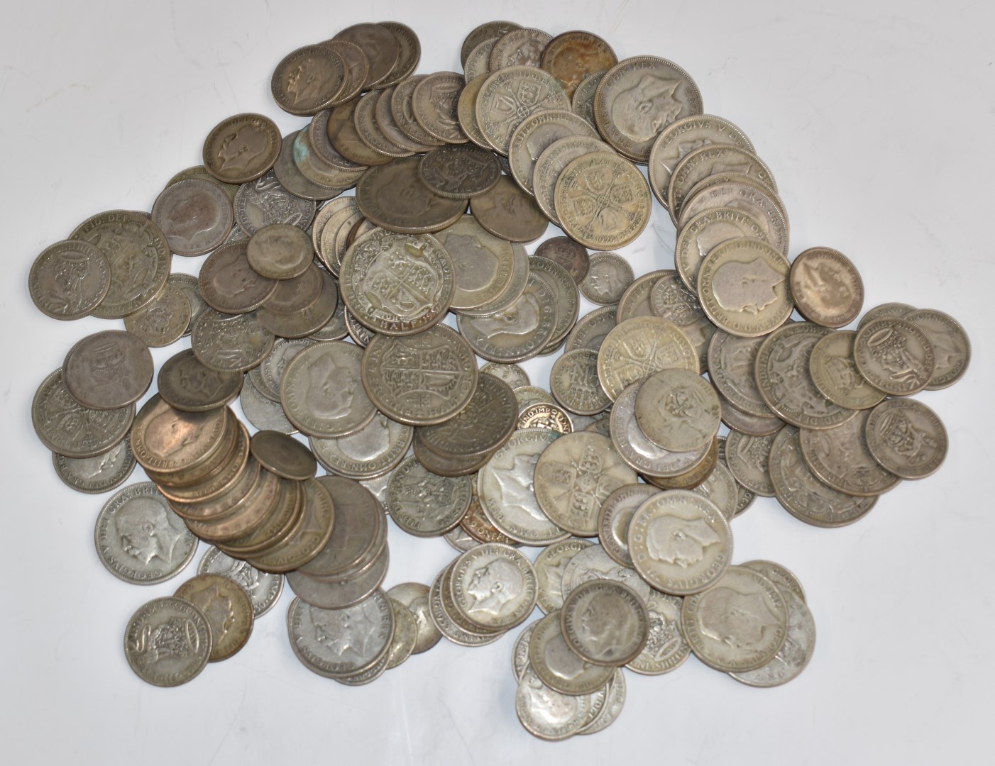 Approximately 1143g of pre-1947 UK silver coinage