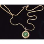 A 9ct gold necklace set with a nephrite jade cabochon and split pearls, 5.5g