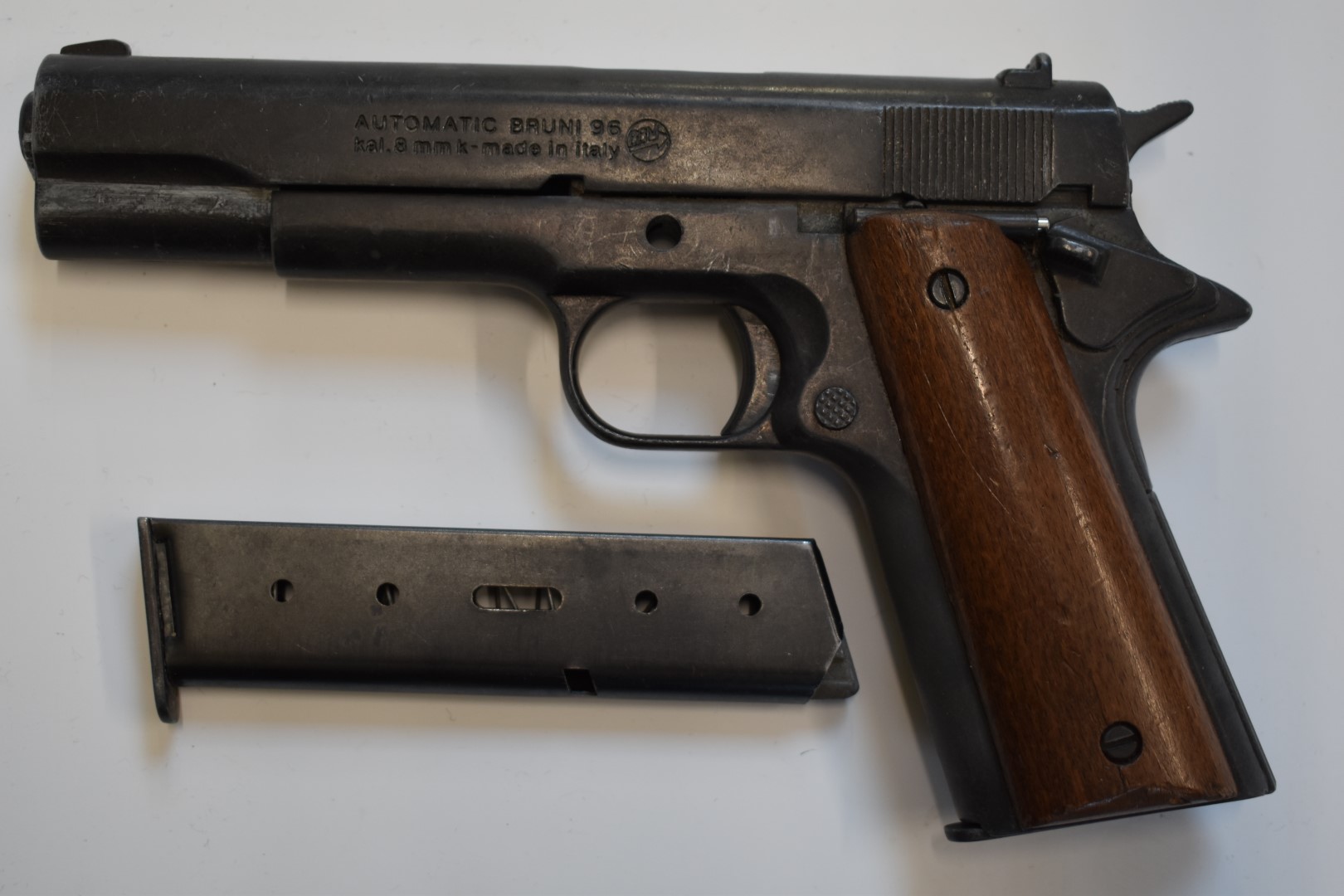 BBM Bruni 96 Automatic 8mm blank firing pistol with wooden grips and a spare magazine. - Image 2 of 4