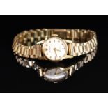Rolex 9ct gold ladies wristwatch ref. 8648 with gold hands and star hour markers, silver dial and
