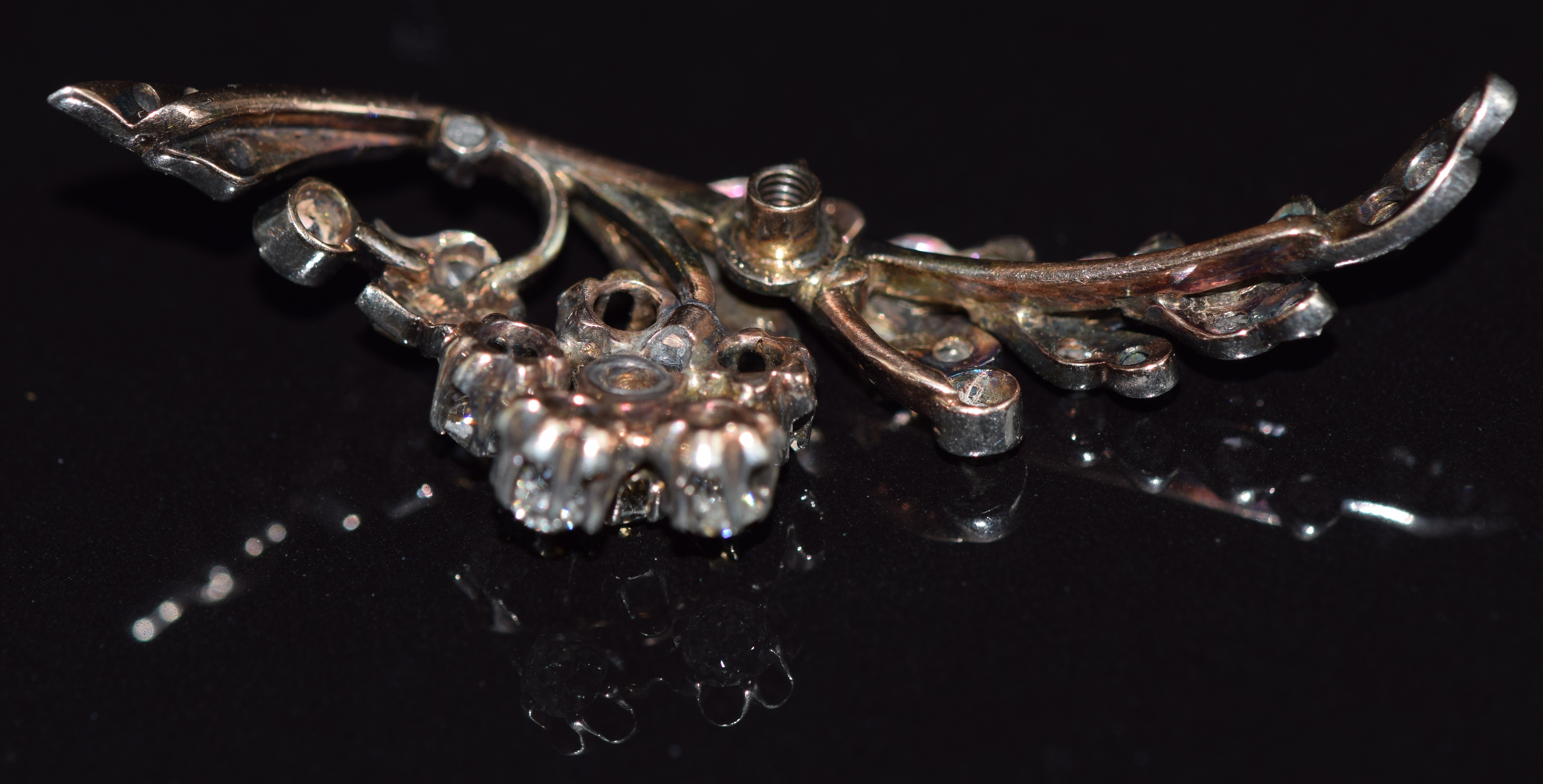 Victorian brooch set with old cut diamonds in a floral and foliate design, 5cm long, 5.5g - Image 2 of 2