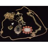 A collection of 9ct gold chains, a Victorian mourning brooch set with hair and coral, locket and