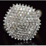 A 9ct gold ring set with diamonds in a large cluster, 4.1g, size P