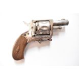 Belgian .22 eight shot blank firing double action revolver with folding trigger, chequered grips and