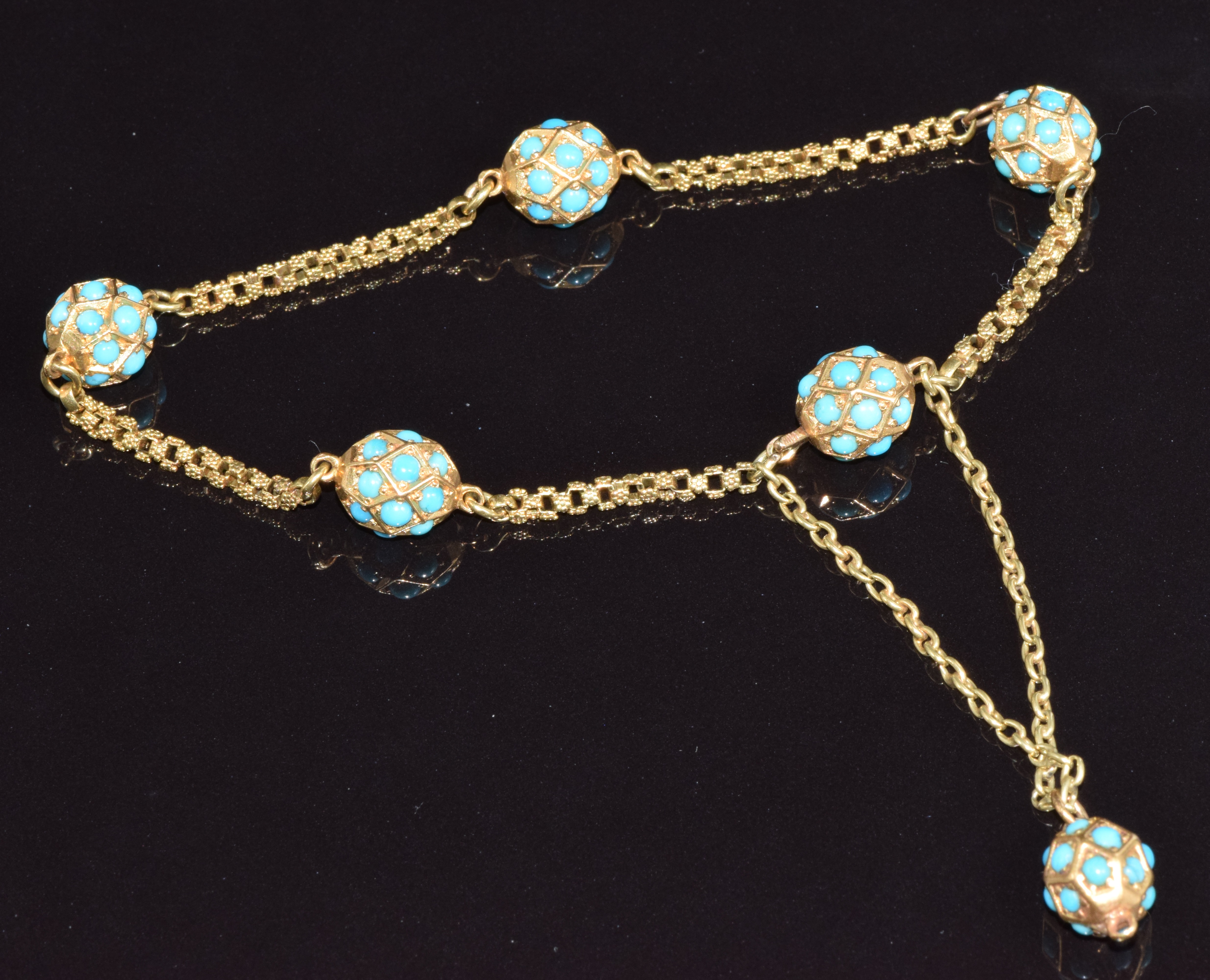 A late Victorian bracelet set with turquoise in spherical settings, 16.6g