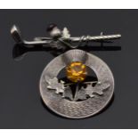 Scottish silver brooch depicting a thistle by WBs, Glasgow 1956, and another silver brooch in the