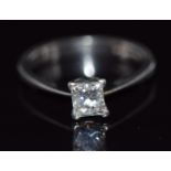 A platinum ring set with a princess cut diamond of approximately 0.62ct, size I/J, 4.1g