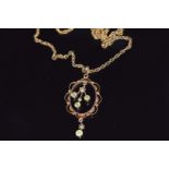 Edwardian 9ct gold pendant set with peridot and seed pearls on 9ct gold chain, 5.7g