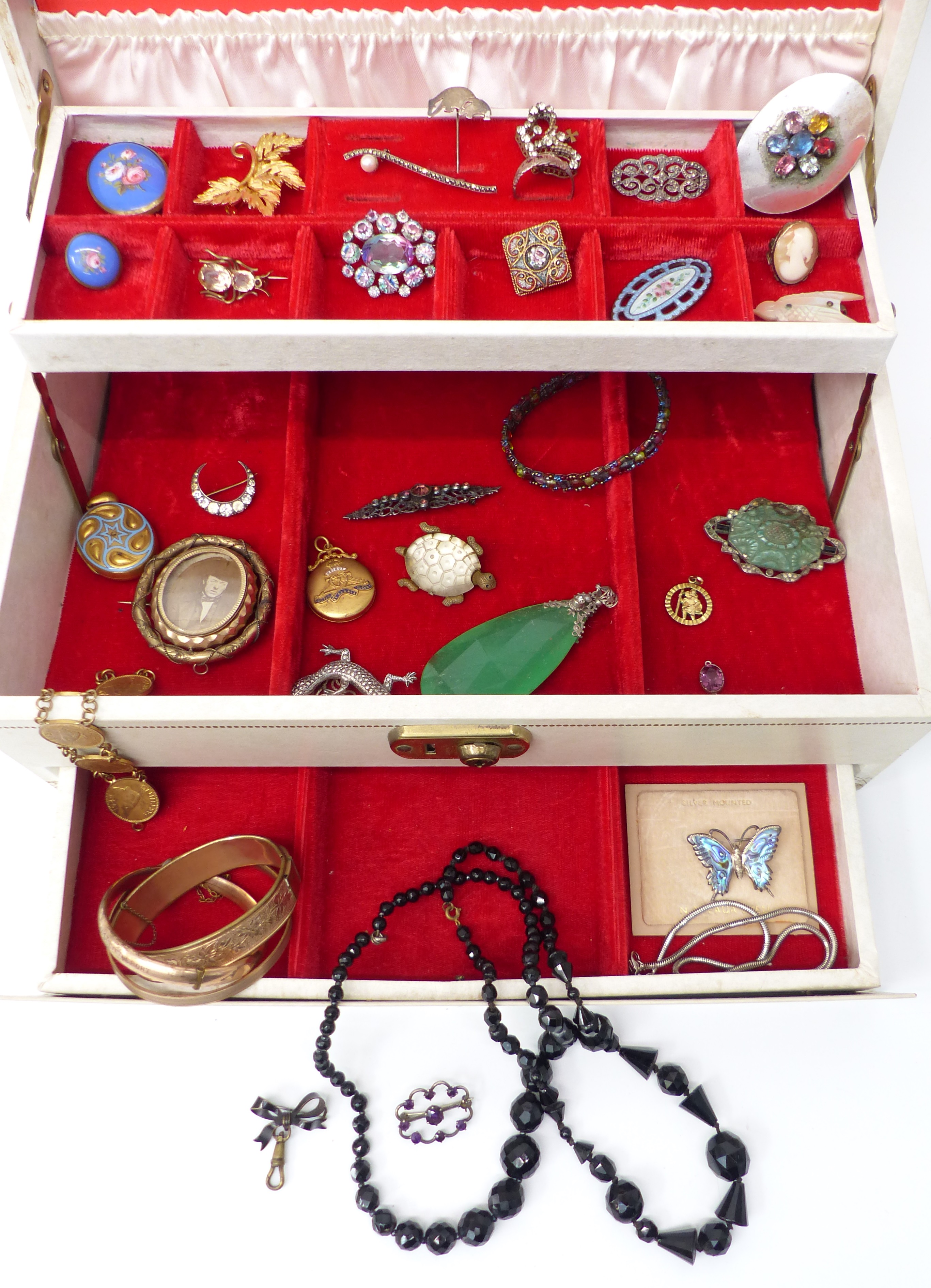 A collection of costume jewellery including Victorian mourning brooch, silver including paste set