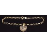 A 9ct gold bracelet and 9ct gold heart pendant/ charm, 1.8g