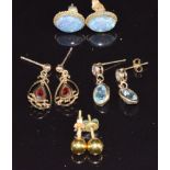 A pair of 9ct gold earrings set with an opal triplet to each, a pair of 18k gold studs, a pair of