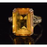 A 9ct gold ring set with an emerald cut citrine 5.4g, size Q