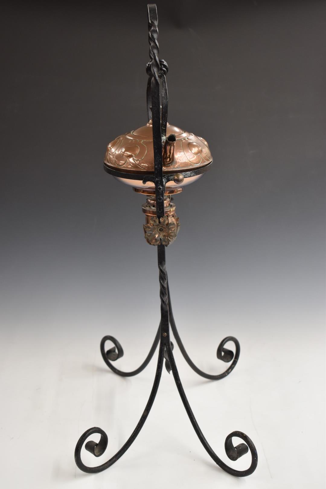 In the manner of W.A.S. Benson Arts and Crafts copper spirit kettle on wrought iron stand, H73cm - Image 2 of 7