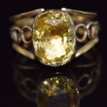 Georgian/ Victorian ring set with an oval cushion cut yellow sapphire of approximately 5ct in a