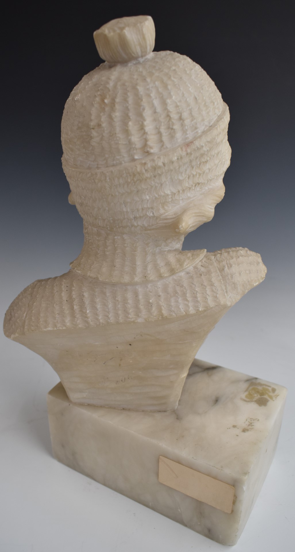 Austrian or similar early 20thC carved alabaster study of a young lady in jumper and hat, - Image 4 of 5
