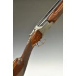 Winchester Super Grade 12 bore over and under ejector shotgun with engraved locks, trigger guard,