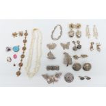 Seven filigree brooches, silver bracelet and earrings, Trifari and other vintage earrings, micro