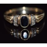 A 9ct gold ring set with an oval cut sapphire, 2g, size Q