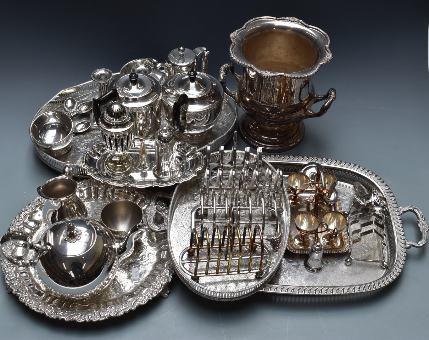 Silver plated ware to include wine cooler, H24cm, galleried Mappin and Webb candlesticks, salver,