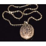 Victorian 9ct gold necklace/ chain (40cm long) and a yellow metal Victorian locket with engraved