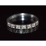 A 14k white gold half eternity ring set with diamonds, 1.6g, size K