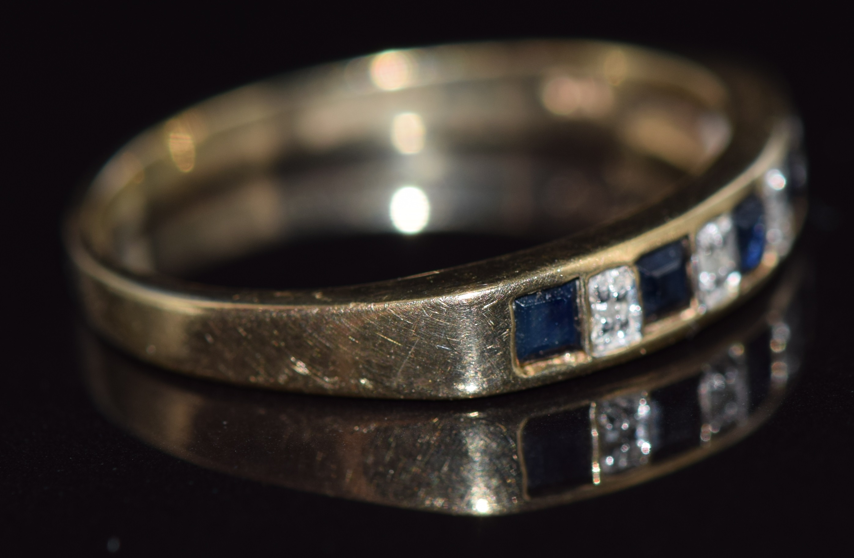 A 9ct gold ring set with alternating sapphires and diamonds, 1.9g, size P - Image 2 of 2