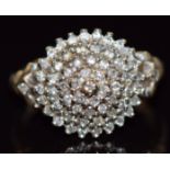 A 9ct gold ring set with diamonds in a cluster, total diamond weight approximately 0.5ct, 4.2g, size