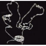 A white metal pendant set with rose cut diamonds on an 18ct white gold necklace, 2.9g