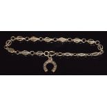 A 9ct gold bracelet with 9ct gold horseshoe charm, 4.2g