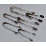 Six pairs of hallmarked silver sugar tongs to include a Georgian bright cut pair, length of