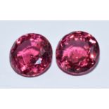 Two loose round cut rubellites, 8.51ct