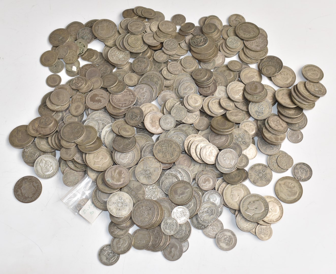 Approximately 3555g of pre-1947 UK silver coinage