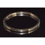 A 9ct gold bangle, 16.2g