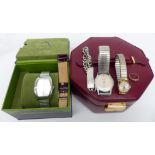 Flying Scotsman watch, two other watches and a 9ct gold ring set with a garnet